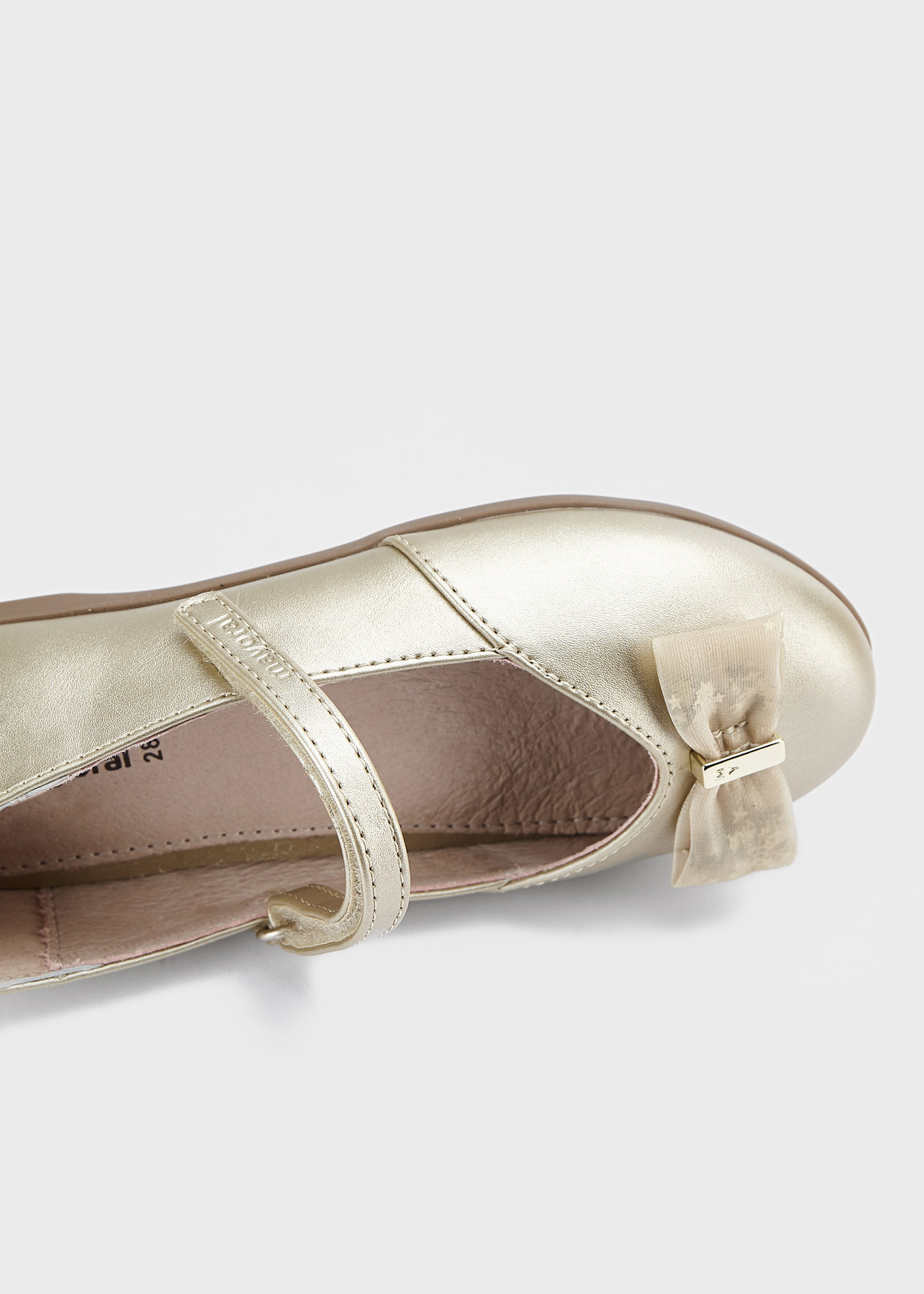 Sapato estilo Mary Jane com palmilha com laço, em couro sustentável, para meninas.