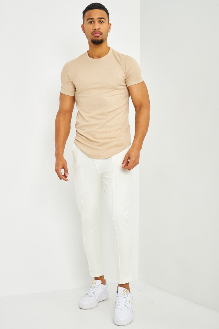 T-shirt motif relief beige manches courtes à revers