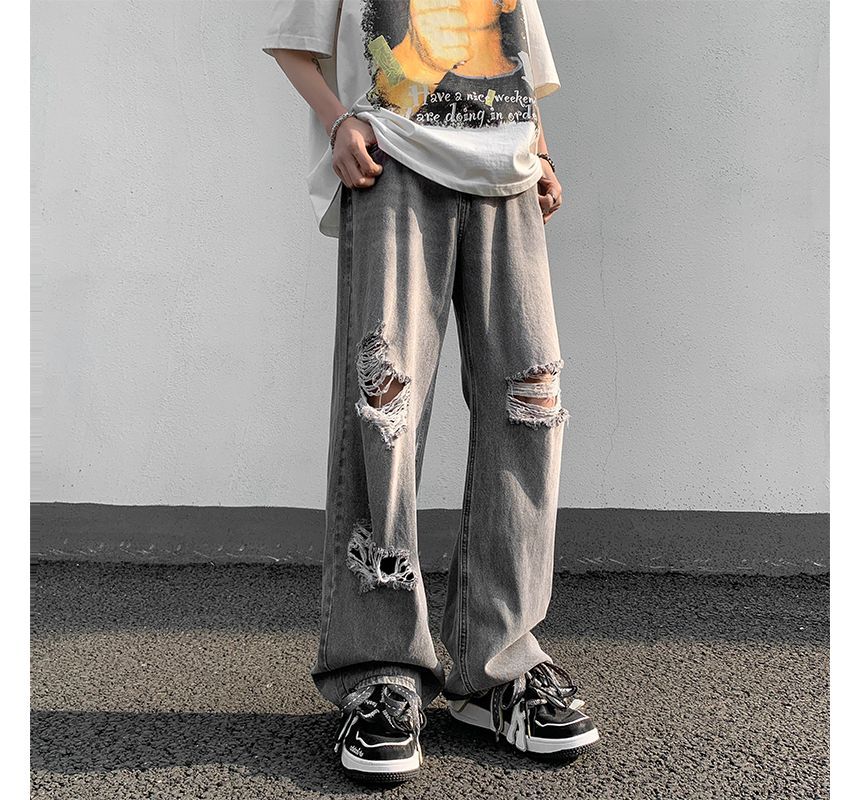 Plummie - Hoge taille jeans met wijde pijpen en distressed look