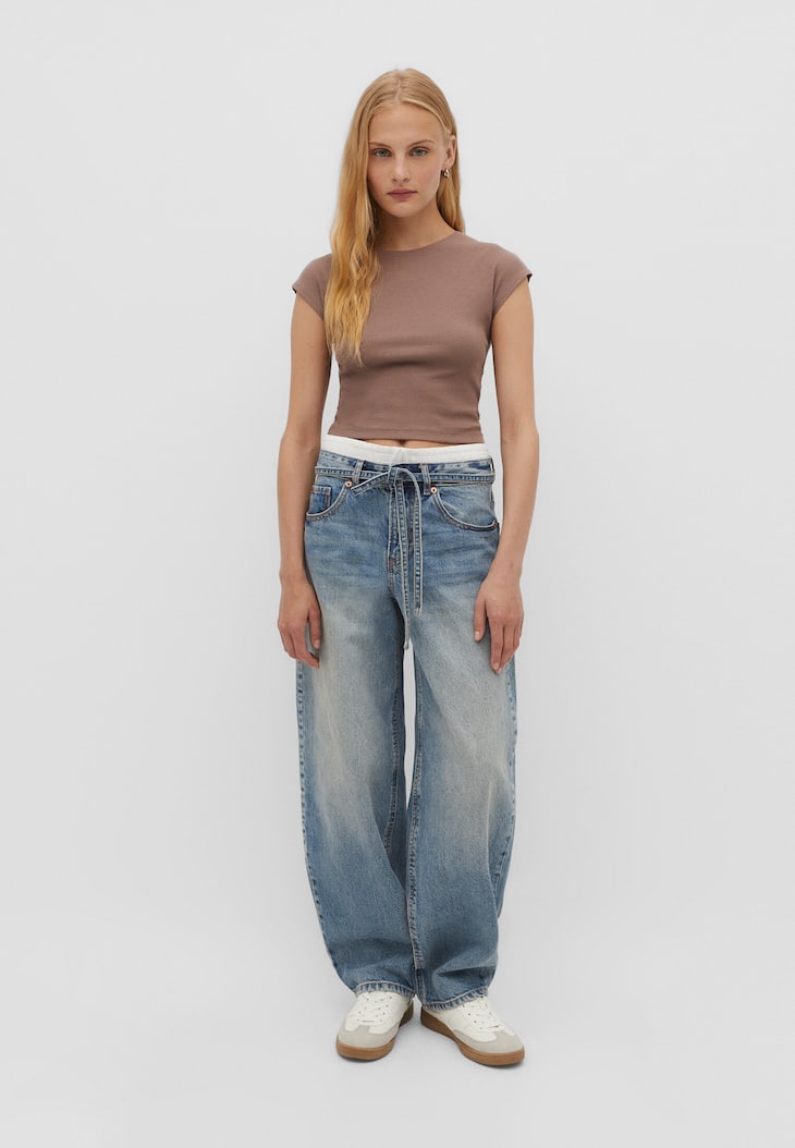 calças jeans de modelagem balão