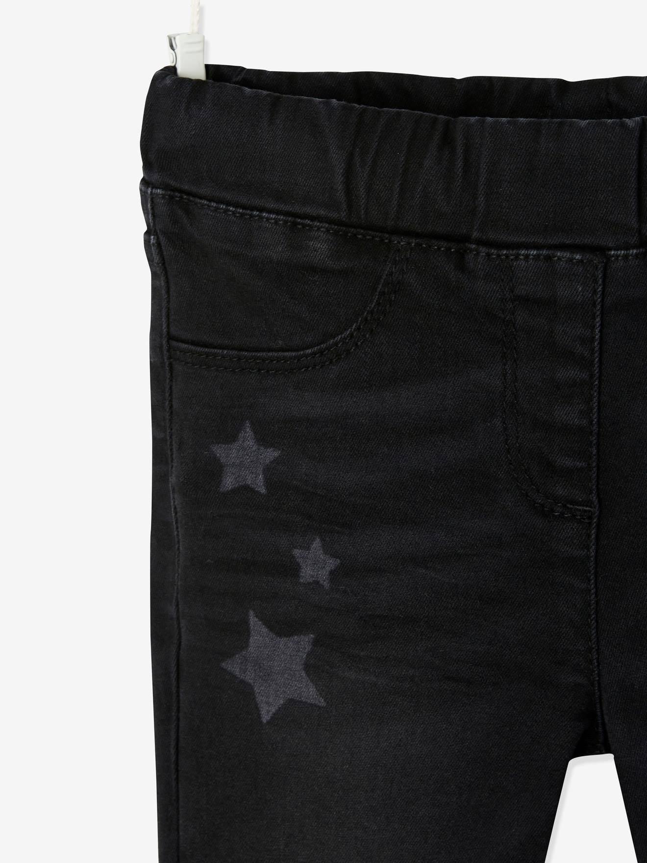 Calça legging infantil com estampa a laser, na cor azul médio lisa com detalhes.