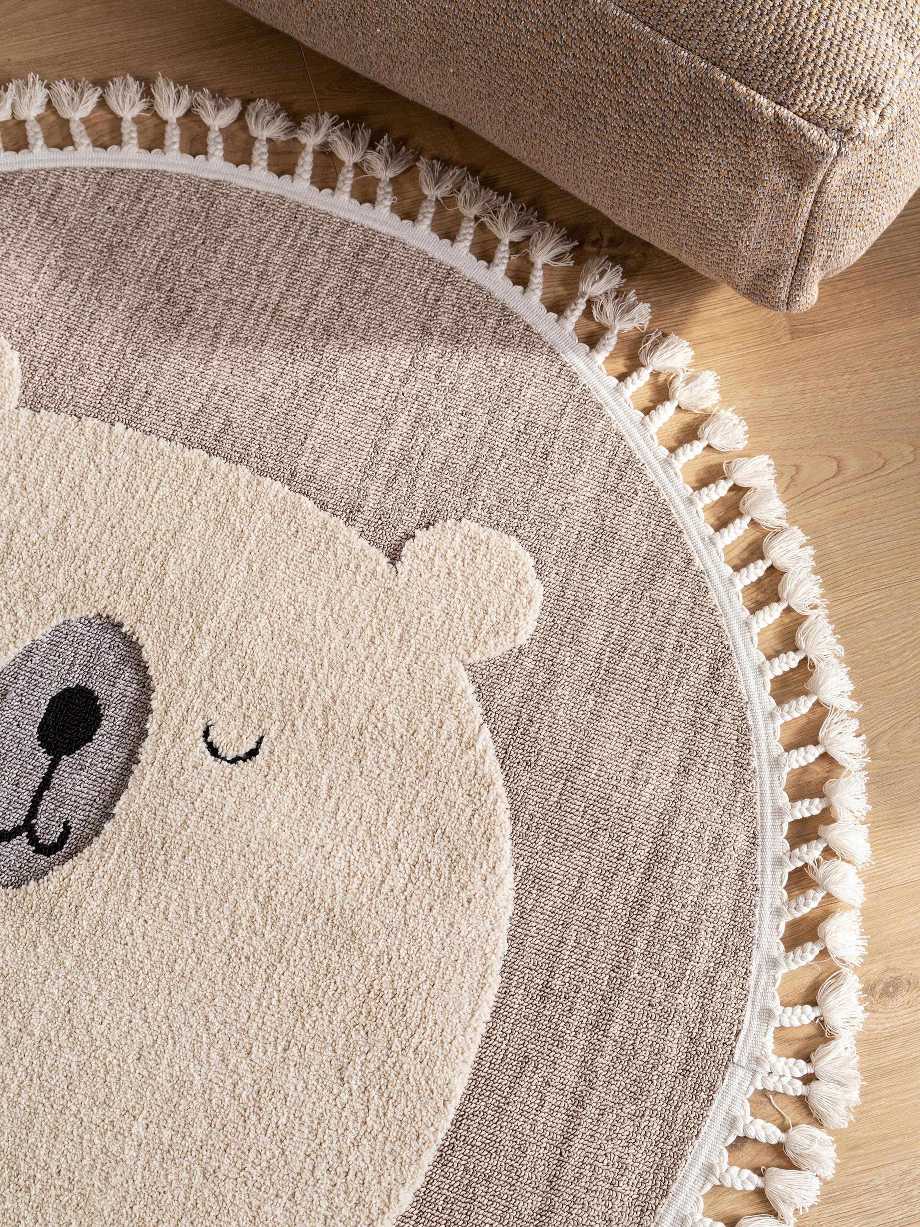 Rond kindervloerkleed Momo met kwastjes en hoog-laag effect