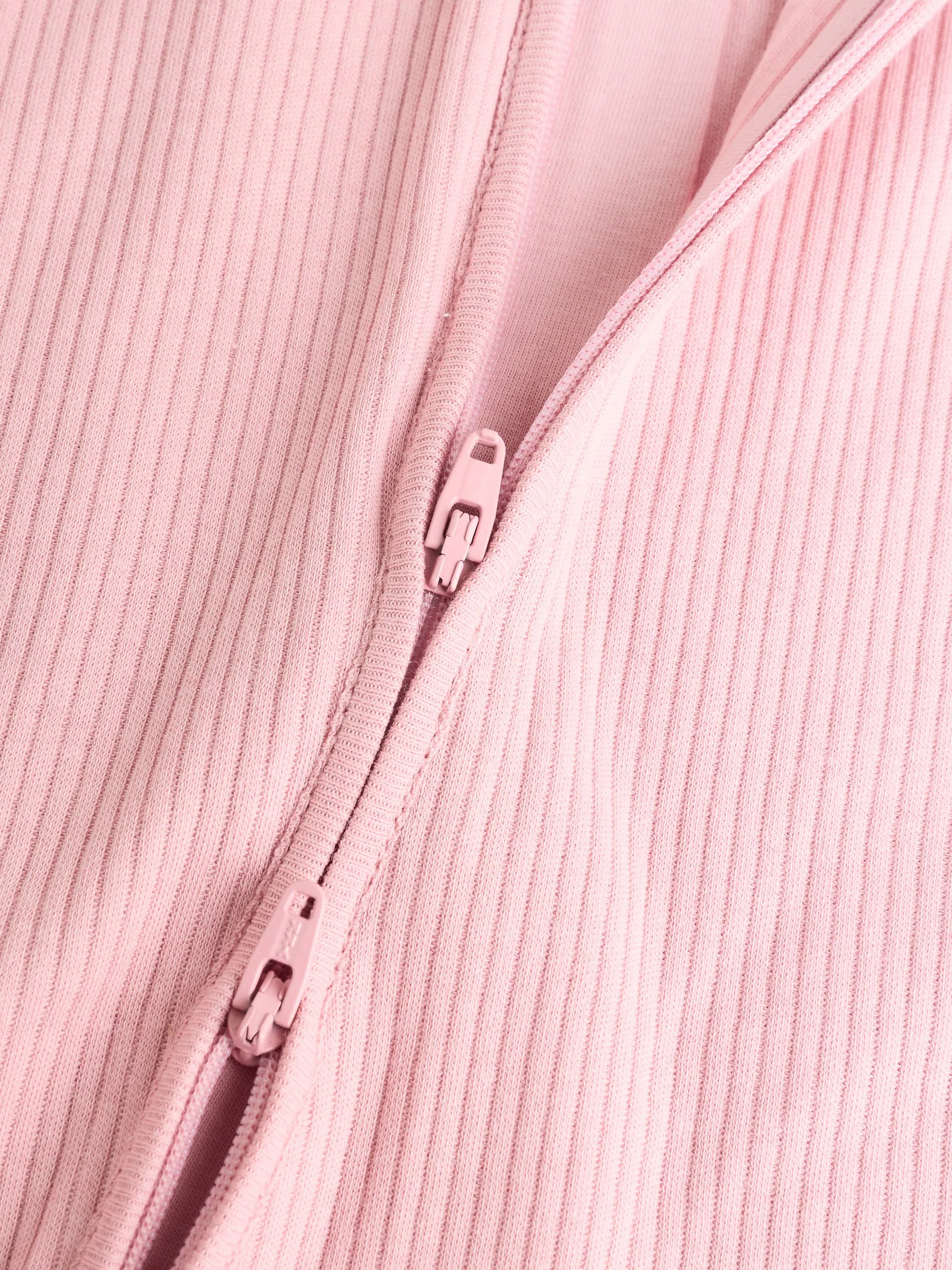Roze - Babypyjama's met tweewegrits (0-2jr)