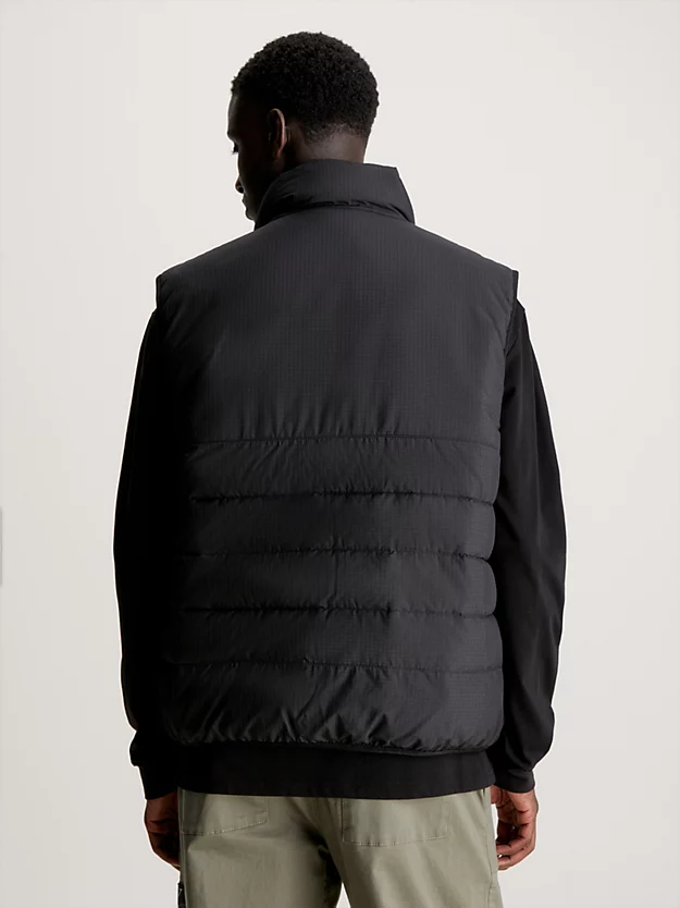 Colete ripstop levemente acolchoado