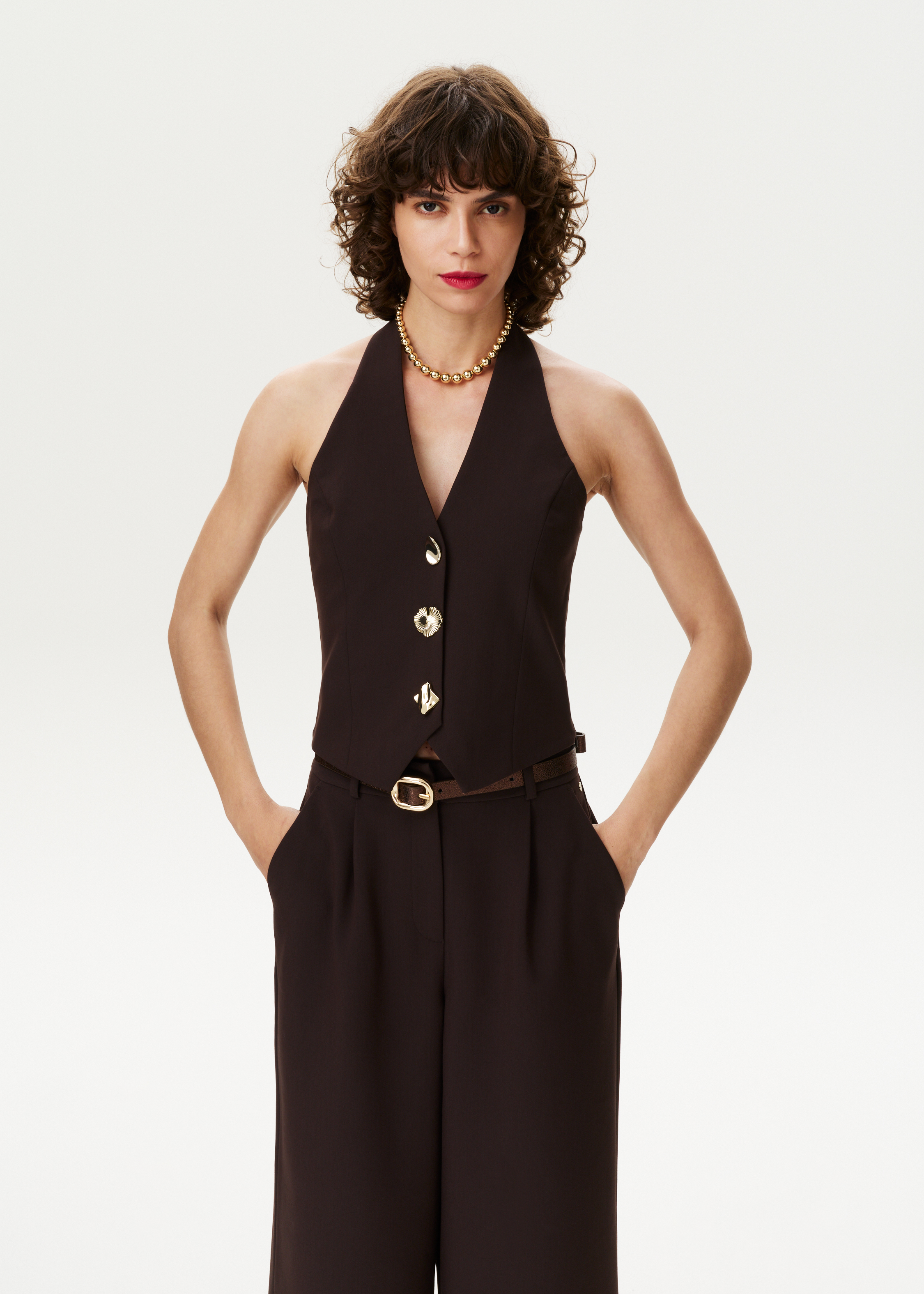 Halter gilet met schelpknopen