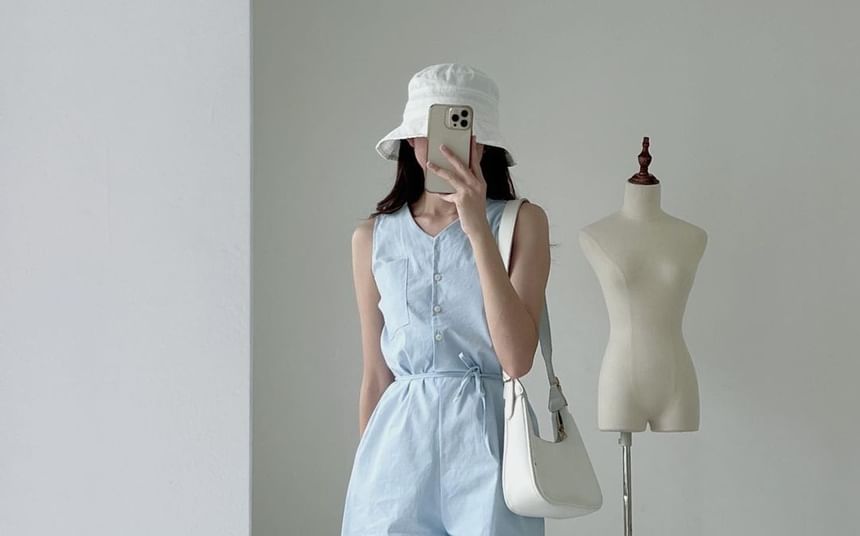 Coris - Mouwloze romper met knoopjes en effen kleur