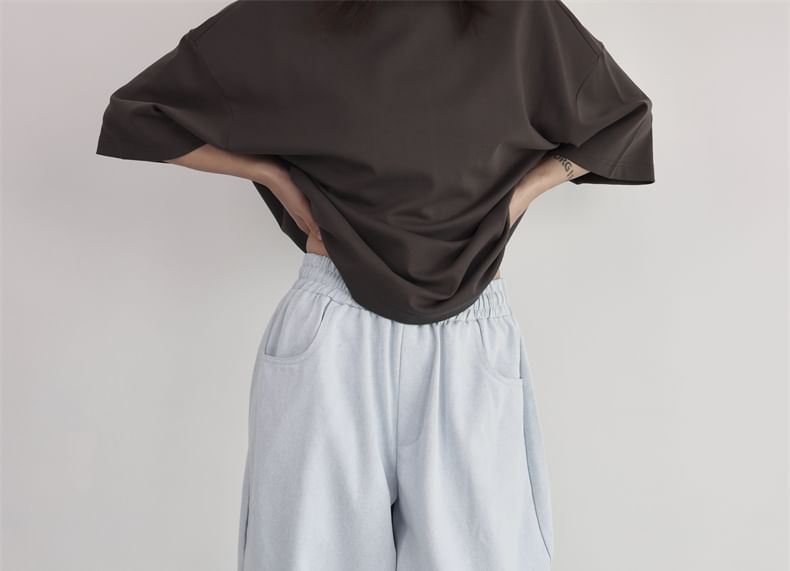SIMPLE BLACK - Effen broek met elastische taille en wijde pijpen