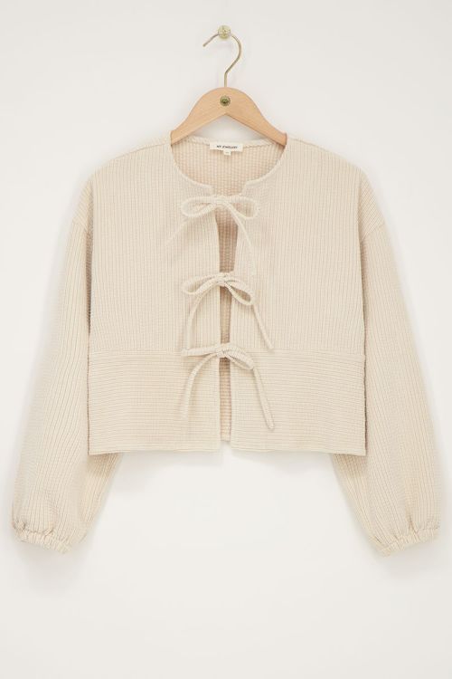 Beige corduroy top met strikjes
