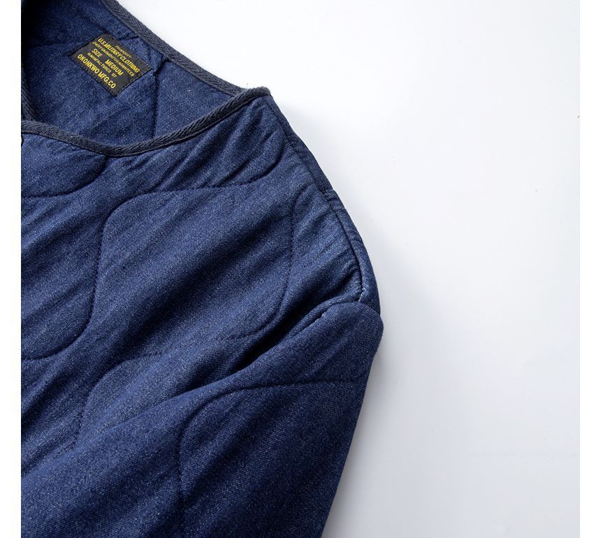 OKONKWO - Gewatteerd denim jack met ronde hals en knopen