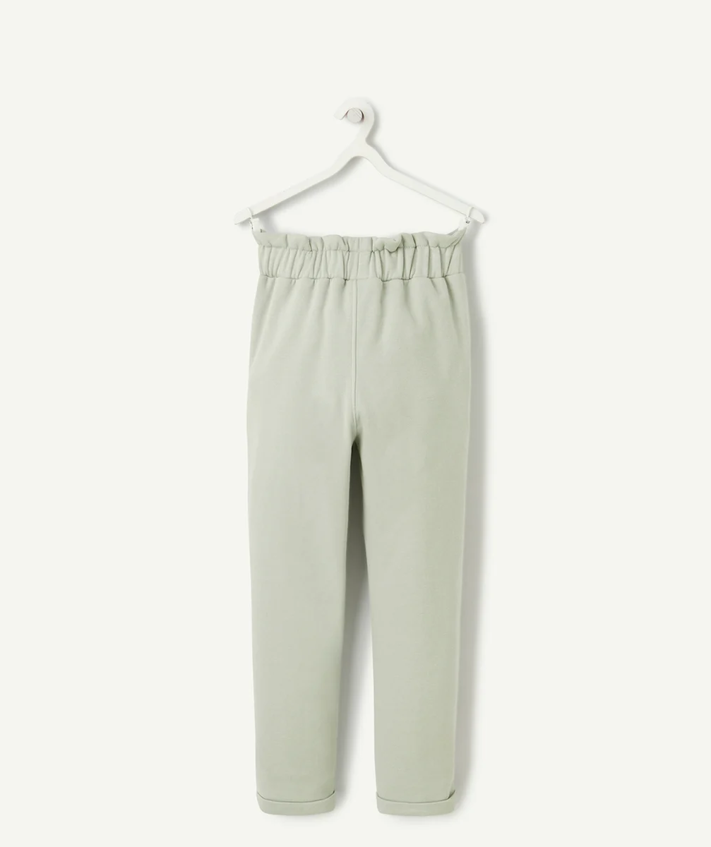 JOGGING FILLE EN FIBRES RECYCLÉES VERT AVEC NOEUD ET LISERÉS PAILLETÉS
