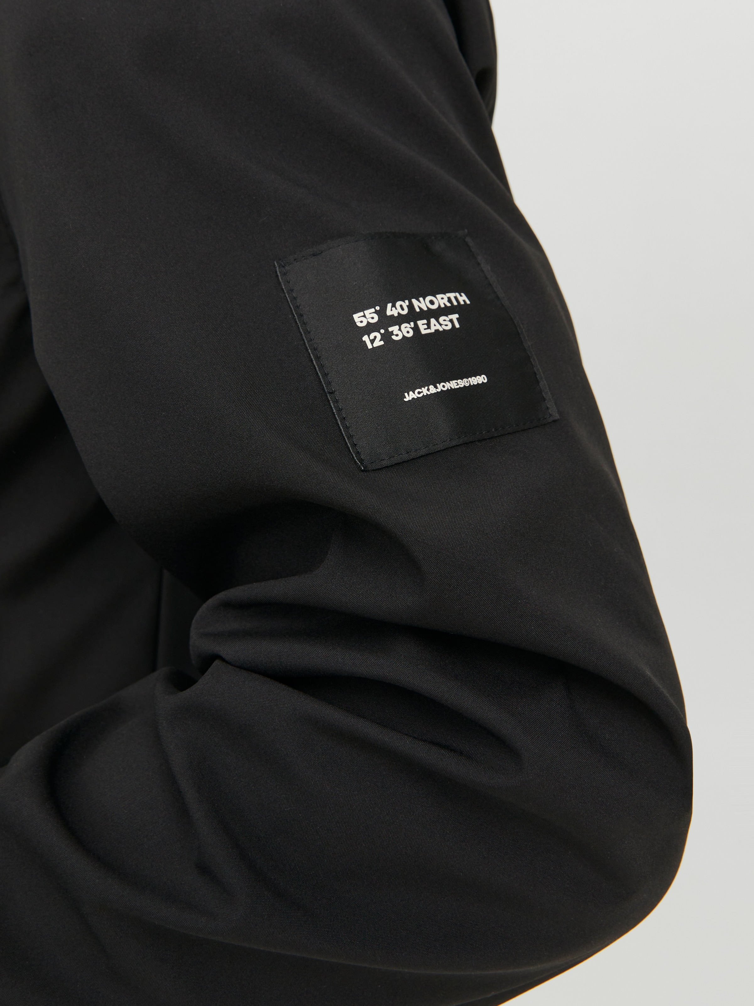 Jack & Jones Softshelljacke »JJEBASIC mit wasserabweisender Funktion« mit Kapuze mit Kordelzug