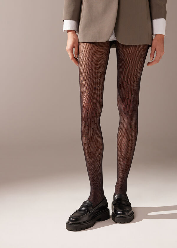 Meia-calça arrastão de 70 denier com estampa de bolinhas