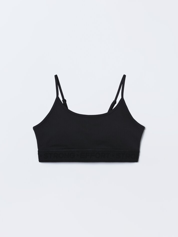 Camiseta esportiva com faixa de texto - Preta