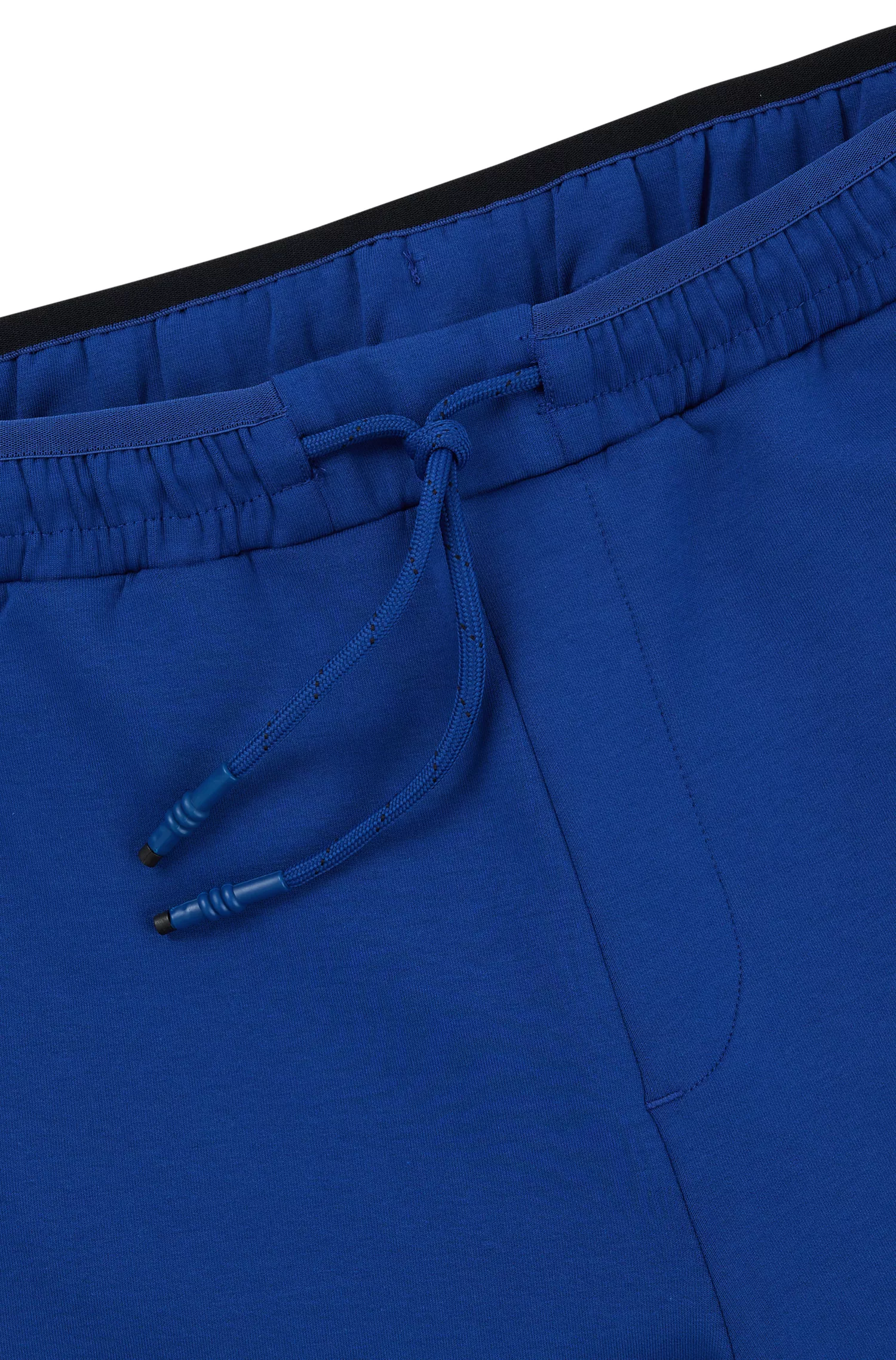 Calça de fato de treino BOSS verde em mistura de algodão com faixa lateral.