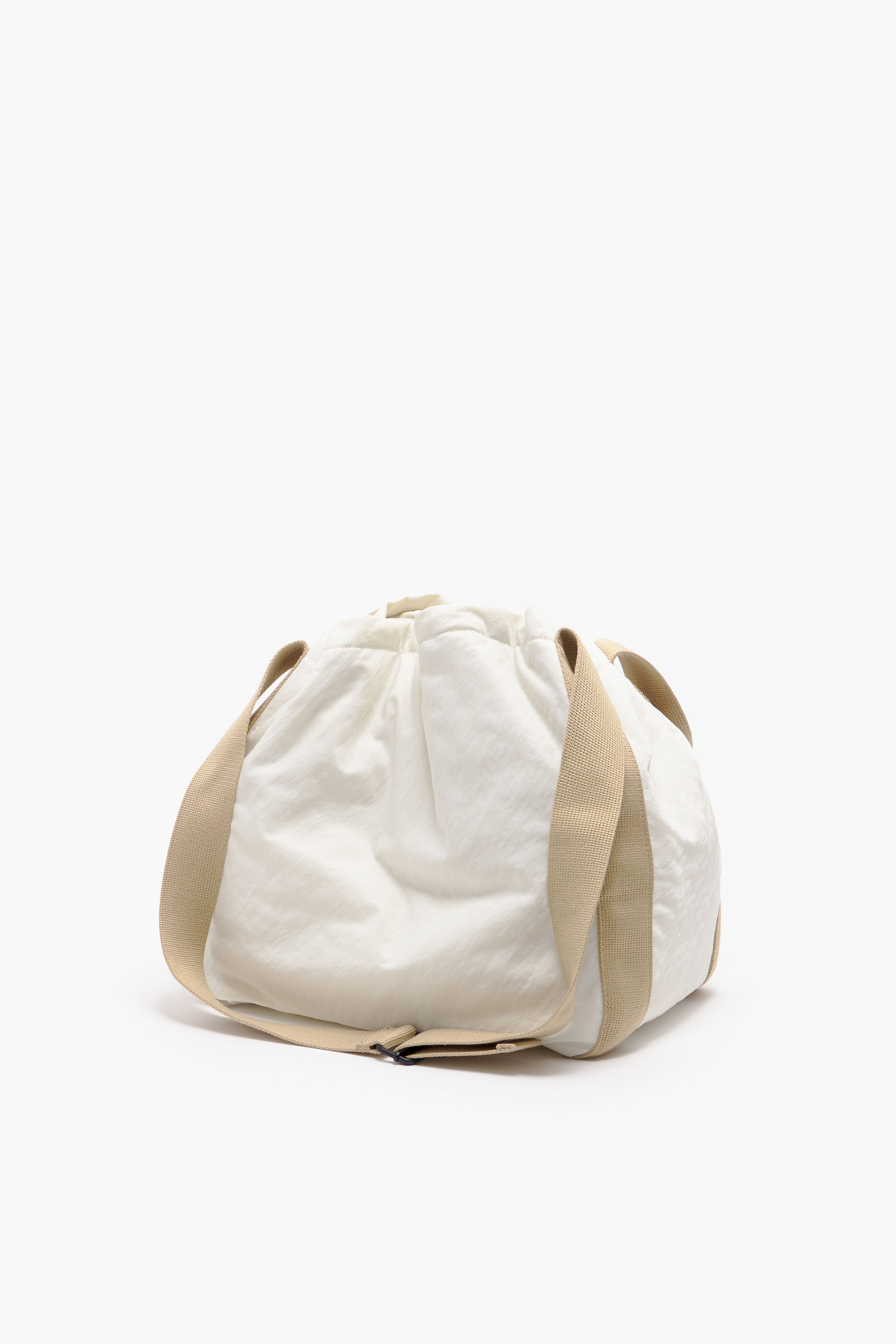 Saco grande de nylon com cordão e estampa de pedra.