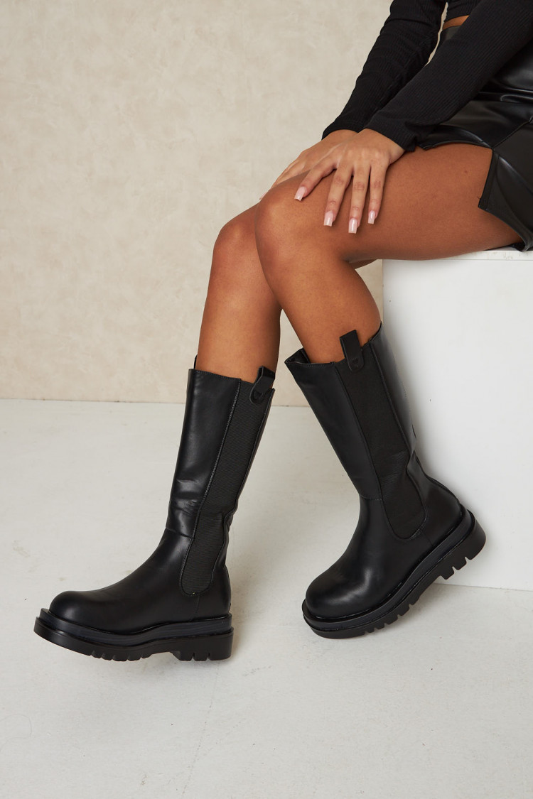 Bottes noires à semelles épaisses montantes