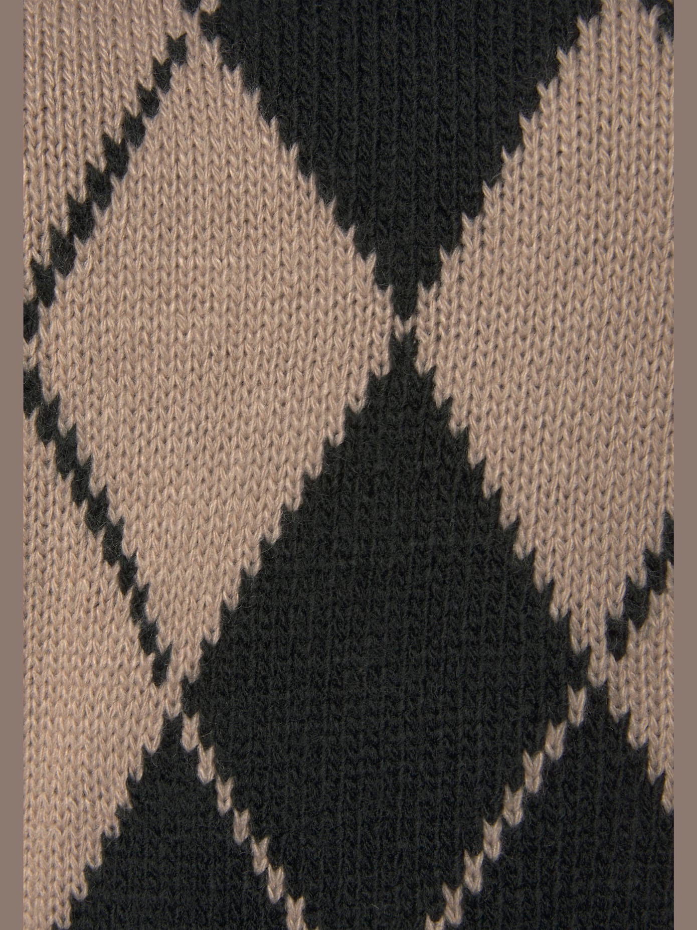 Pull à losanges encolure haute