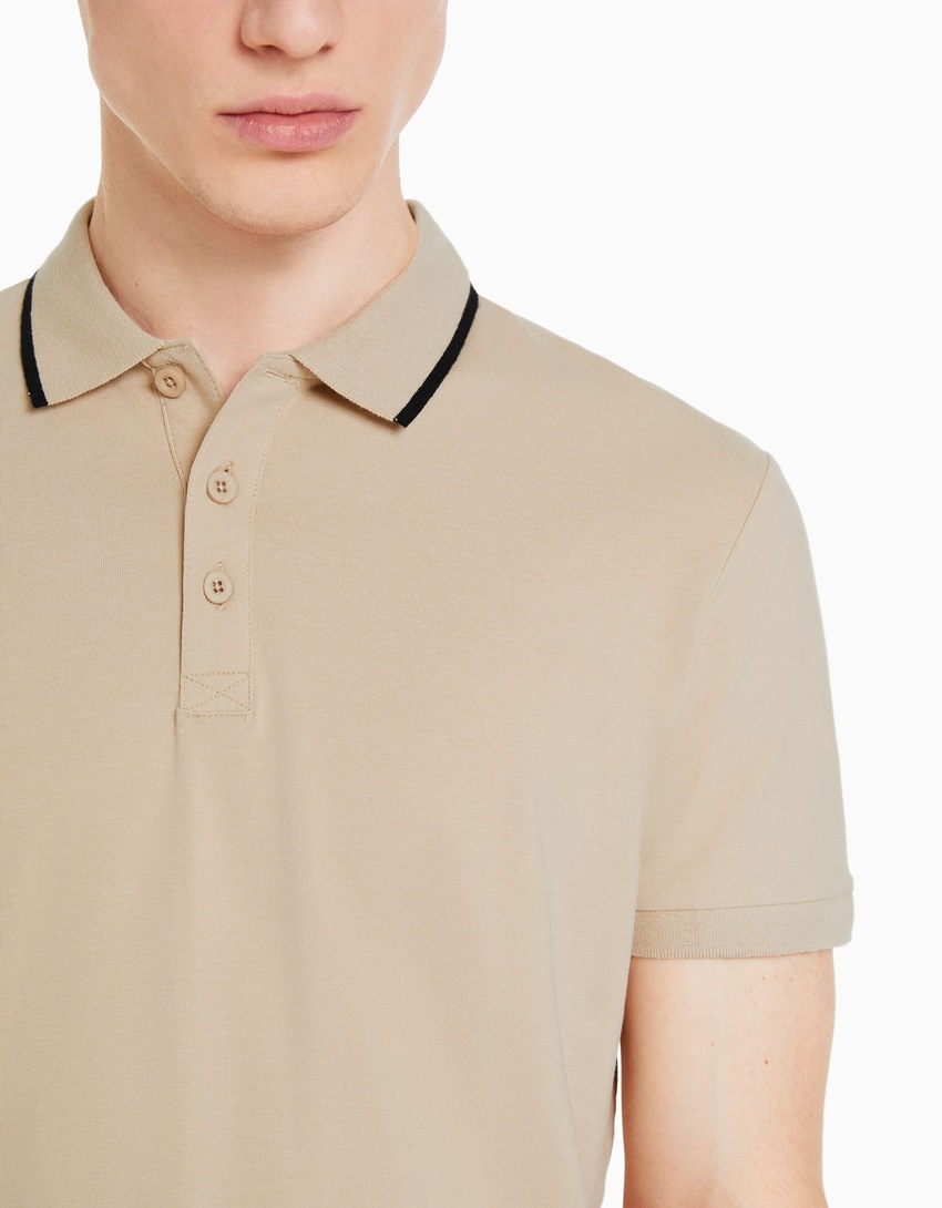 Camisa polo listrada de manga curta