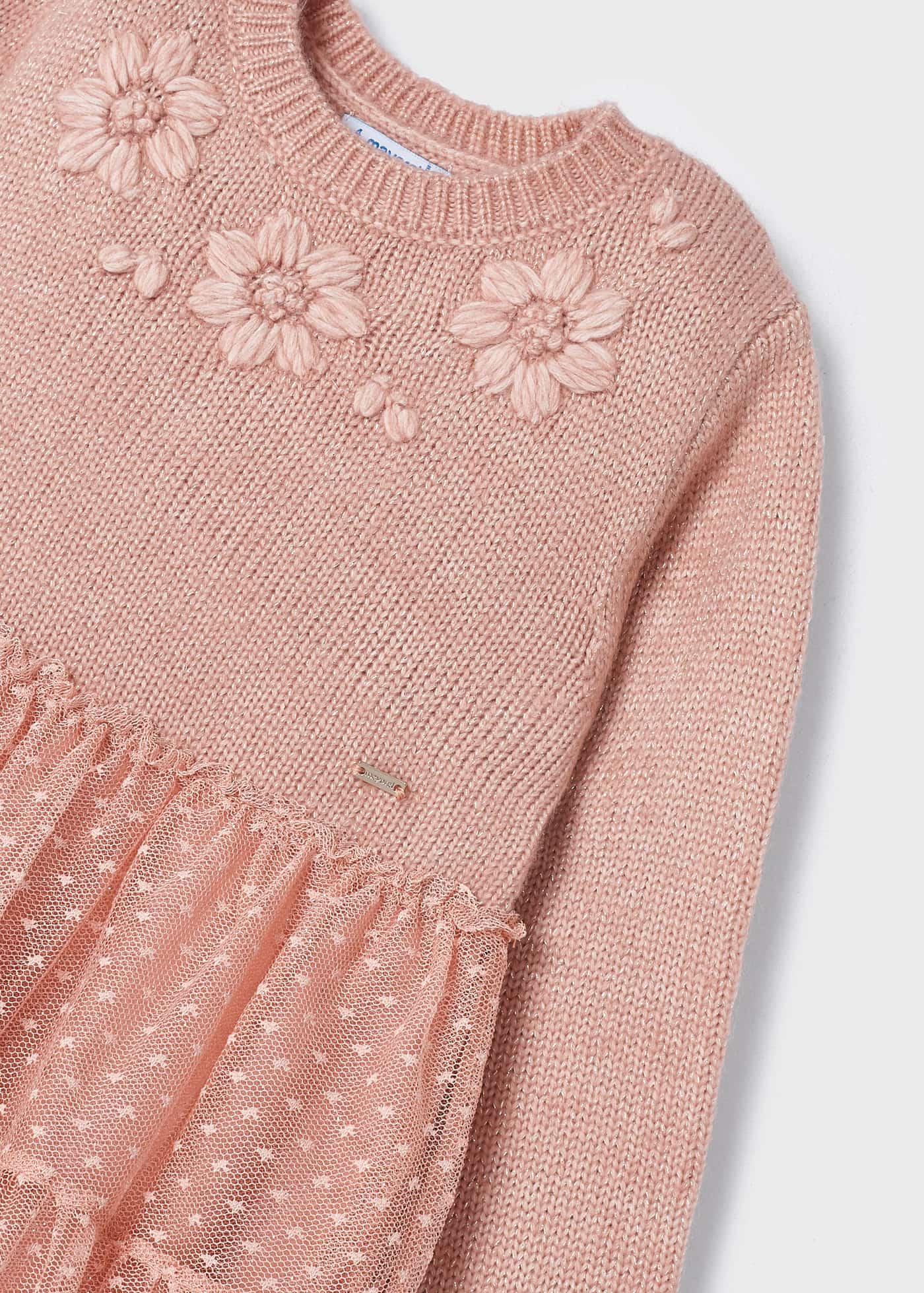 Vestido infantil combinando malha e tule.