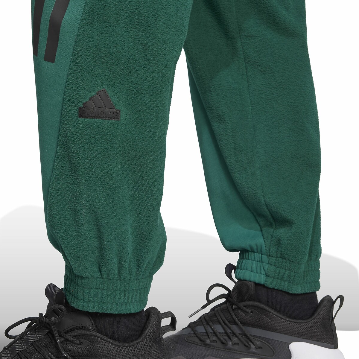 ADIDAS ROUPAS ESPORTIVAS<br>Calça de moletom com 3 listras