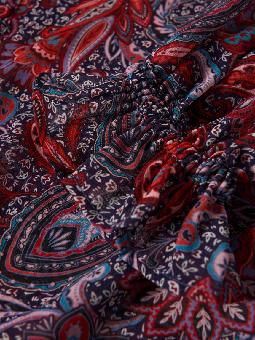 Blusa semitransparente com padrão cornucópias