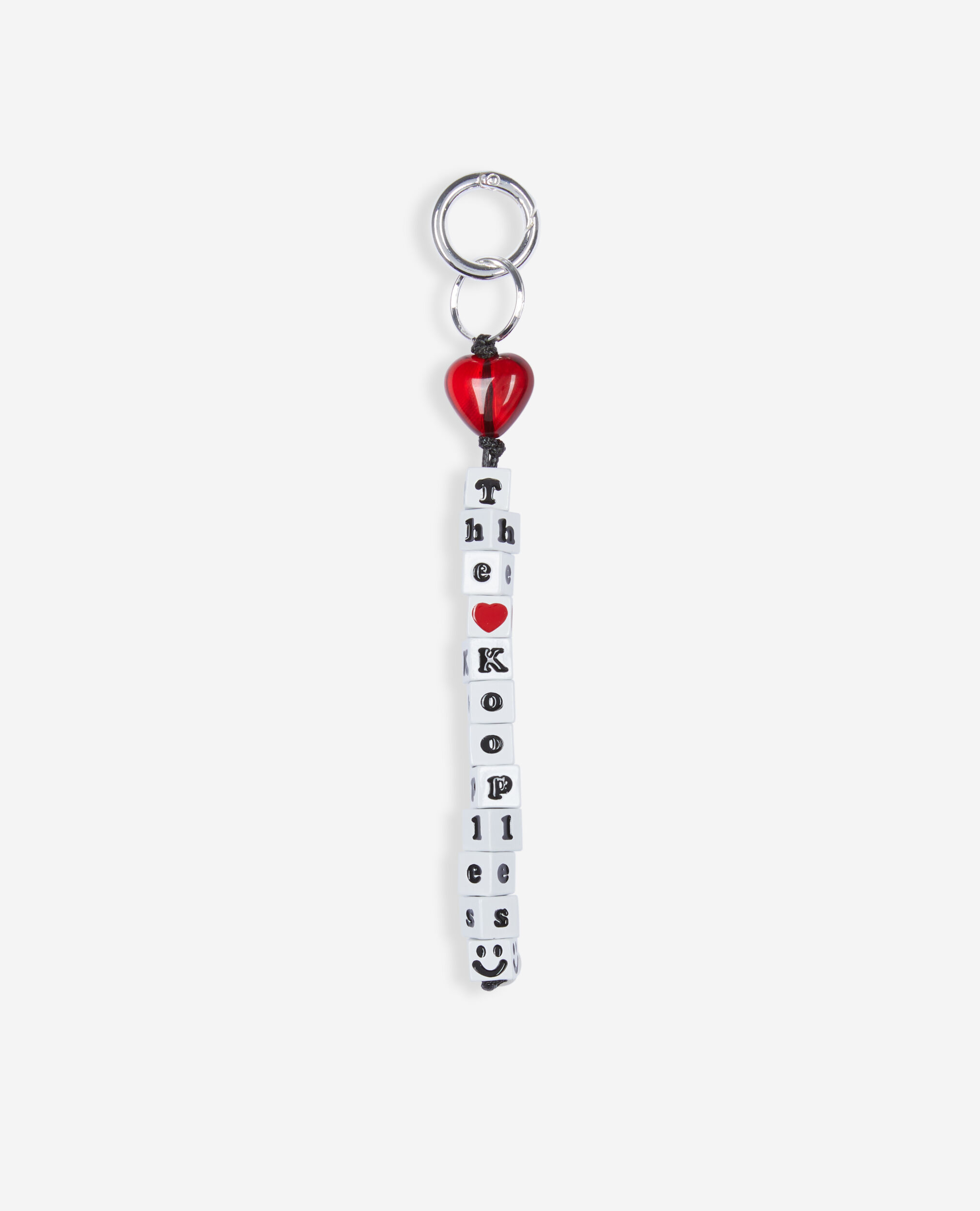 Bijou de sac à perles blanc et rouge