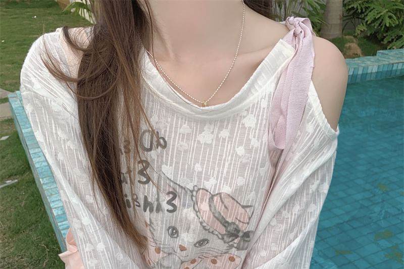 Tel tot 10 - T-shirt met lange mouwen en kattenprint en strik