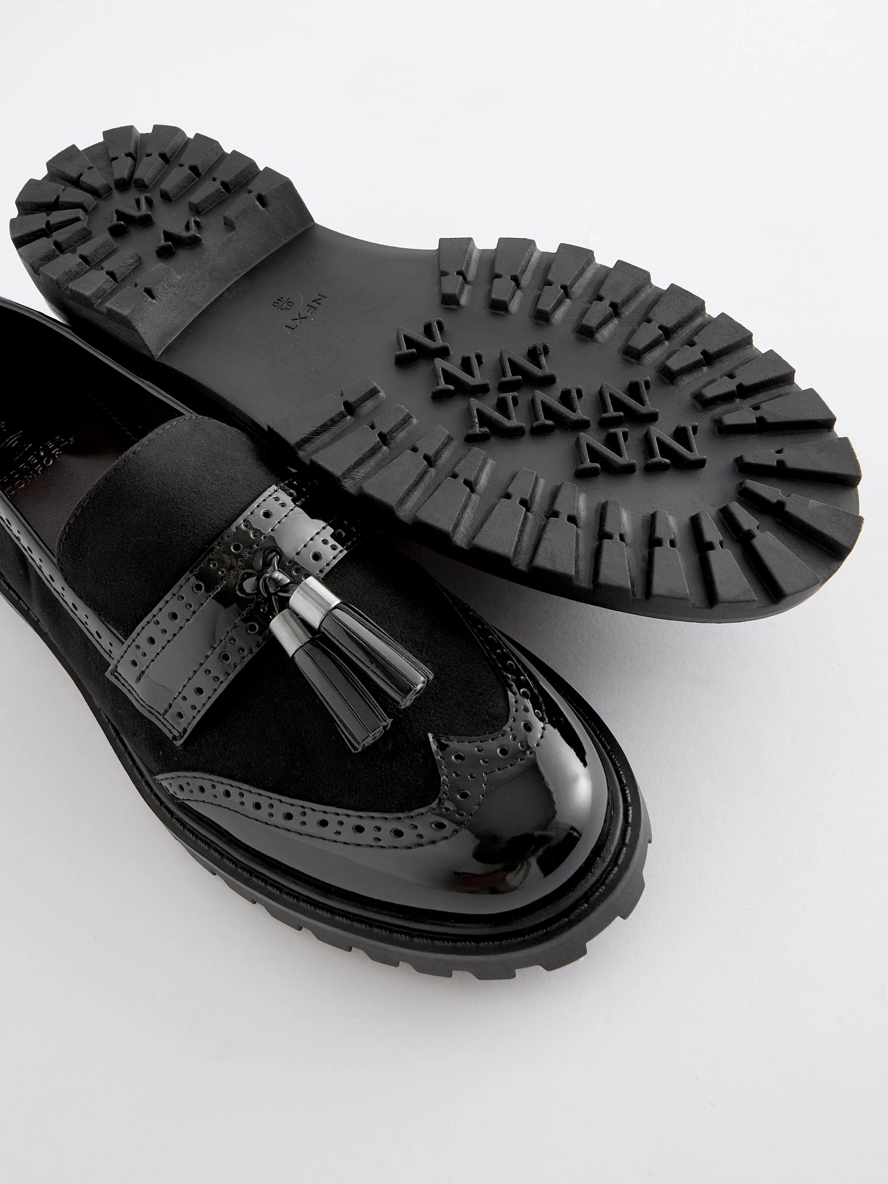 Zwarte mix - Loafers met dikke zool met profiel en kwastjes