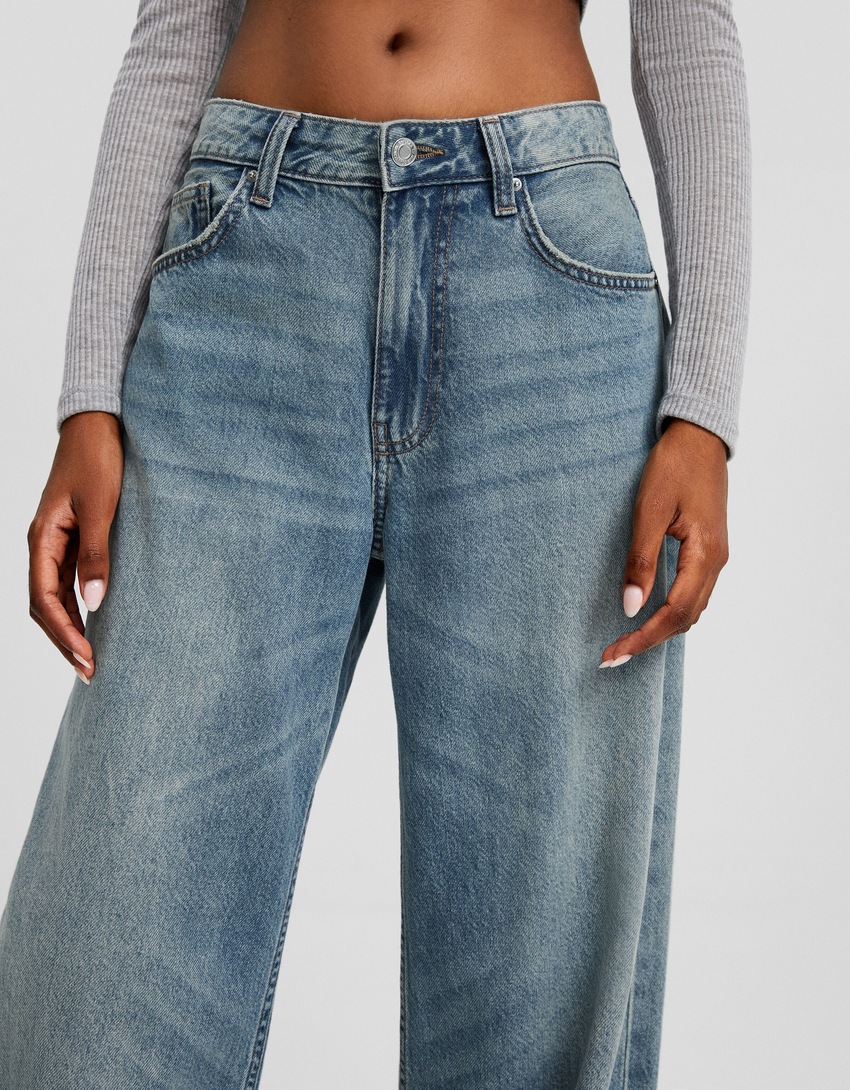 calça jeans de perna larga