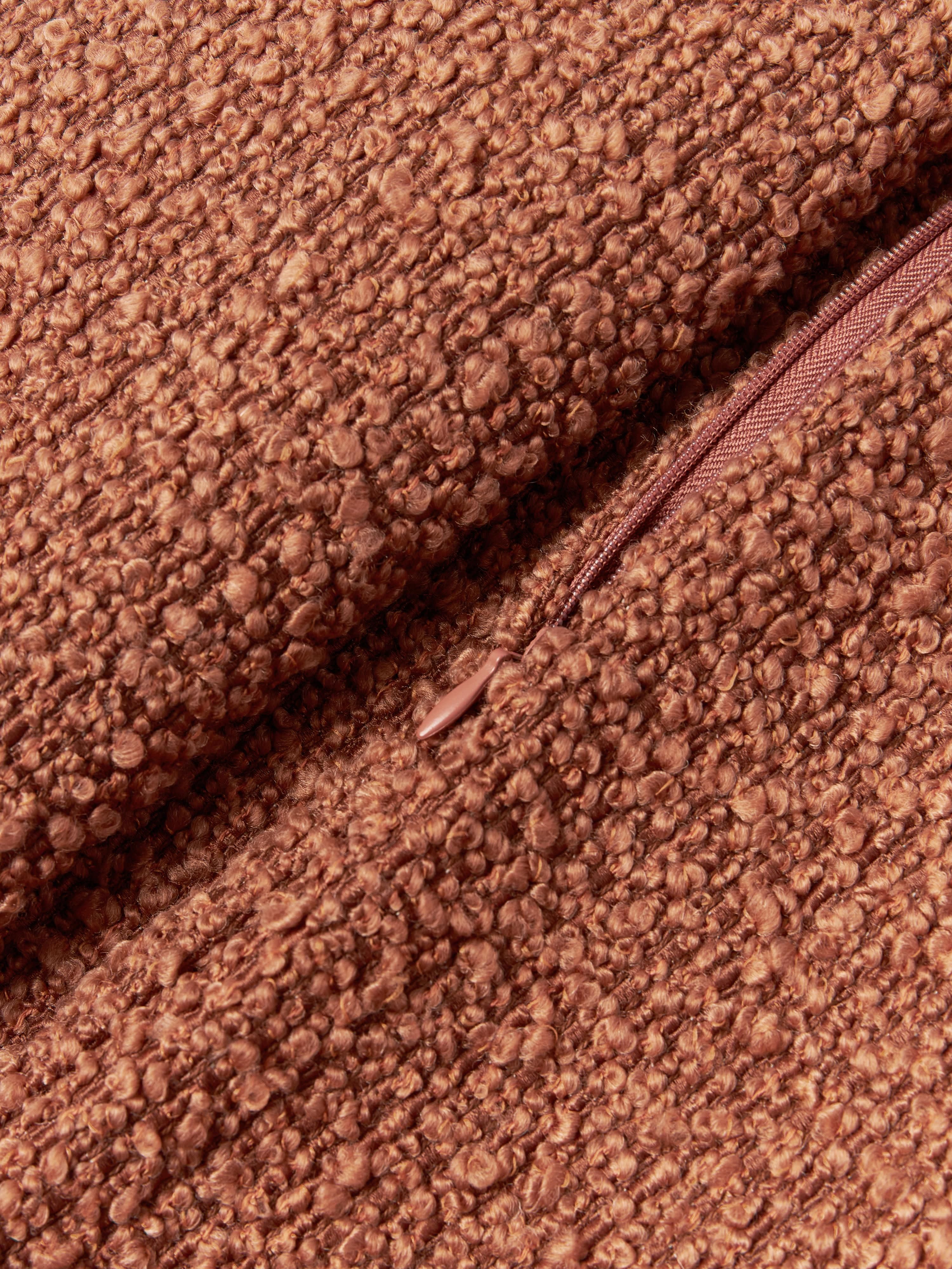 Bouclé kussenhoes Bellamie