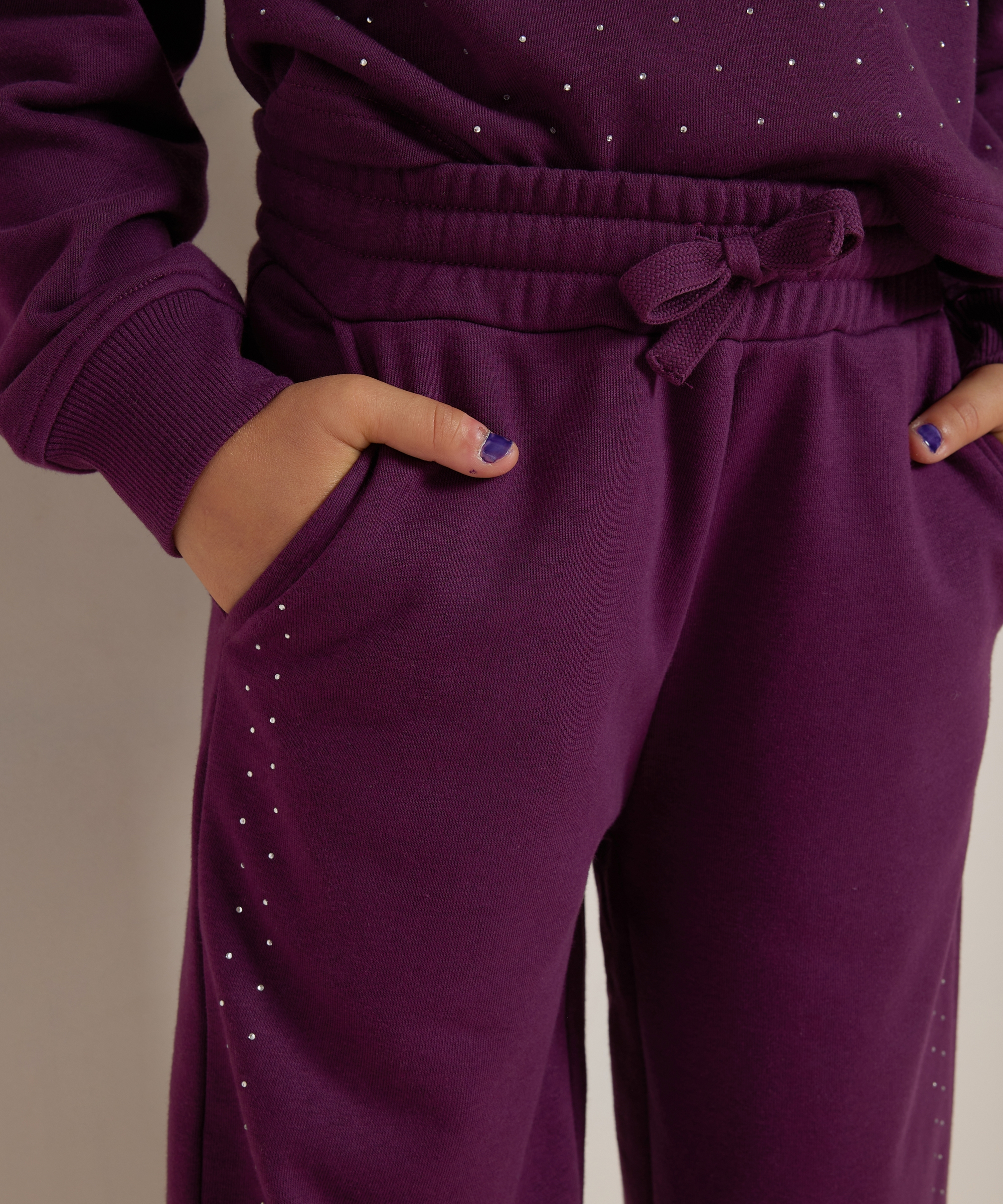 joggingbroek met glittersteentjes
