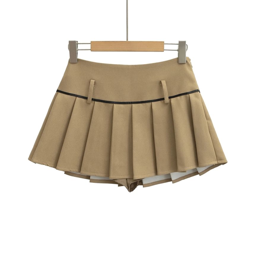 Asiris - Mini A-lijn geplooide rok met hoge taille en strikaccent