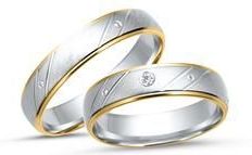 Trouwringen 8 karaat geel-wit goud met Diamant