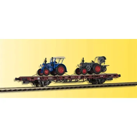Kibri 26252 Niederbordwagen mit zwei Lanzbuldogs, Fertigmodell, Spur H0