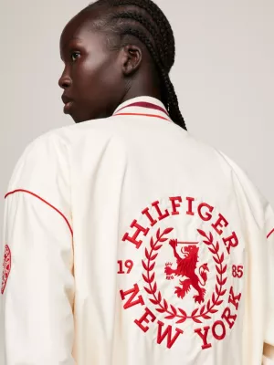 Jaqueta de beisebol oversized com logo traseiro TH Crest