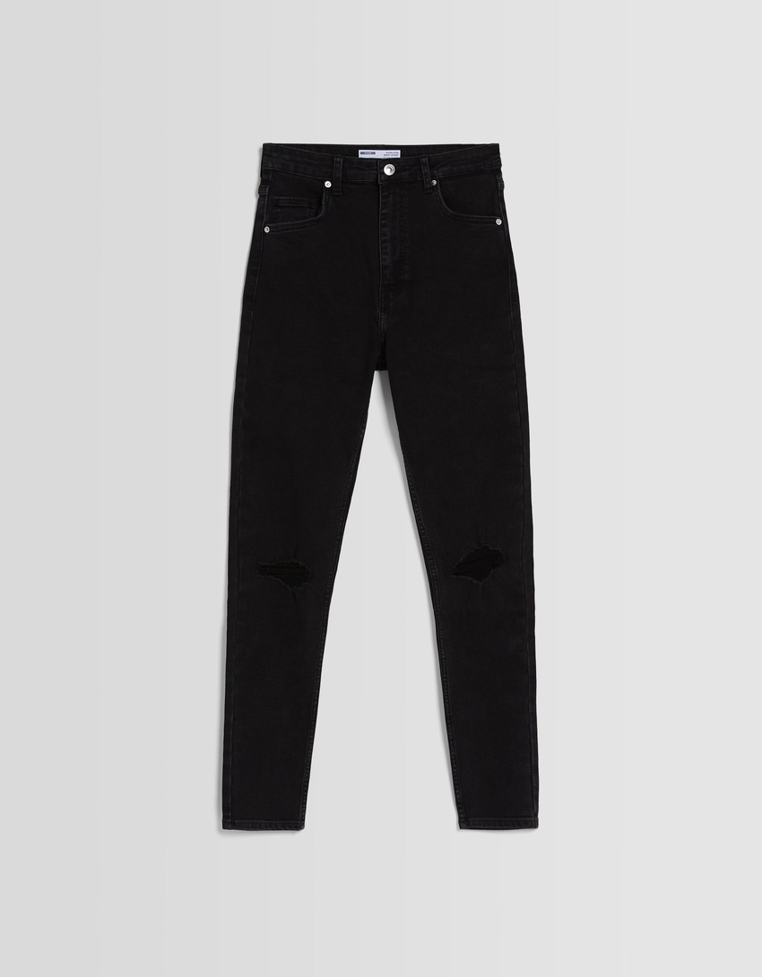 Calça jeans skinny de cintura super alta e rasgada
