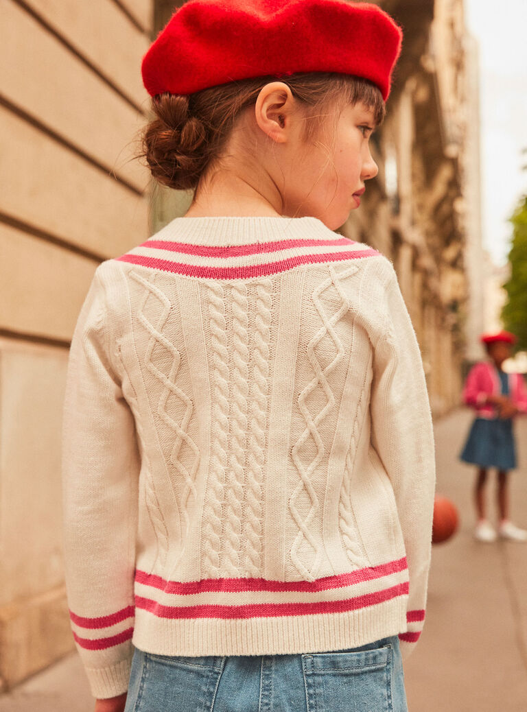 Pull écru en maille torsadée