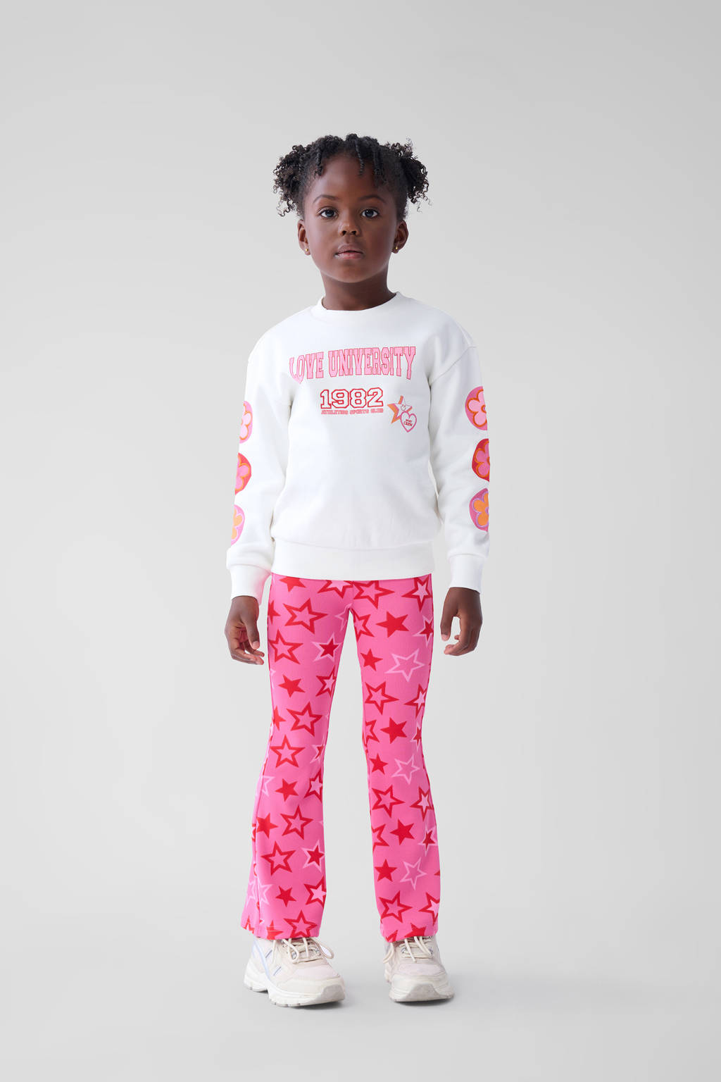 Shoeby high waist flared broek met all over print roze