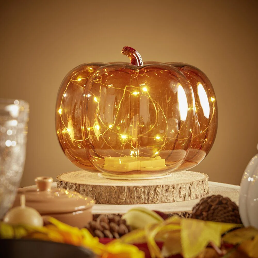 Citrouille avec guirlande LED verre transparent orange Ø18x16cm