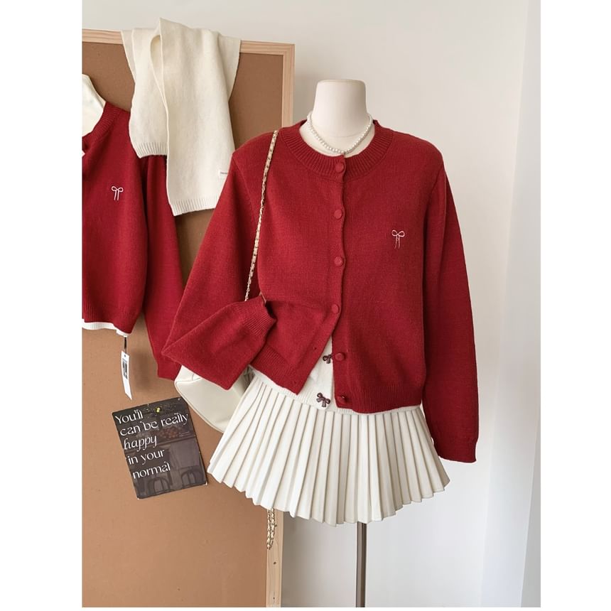 Dute - Mock tweedelig vest met ronde hals en strikborduursel