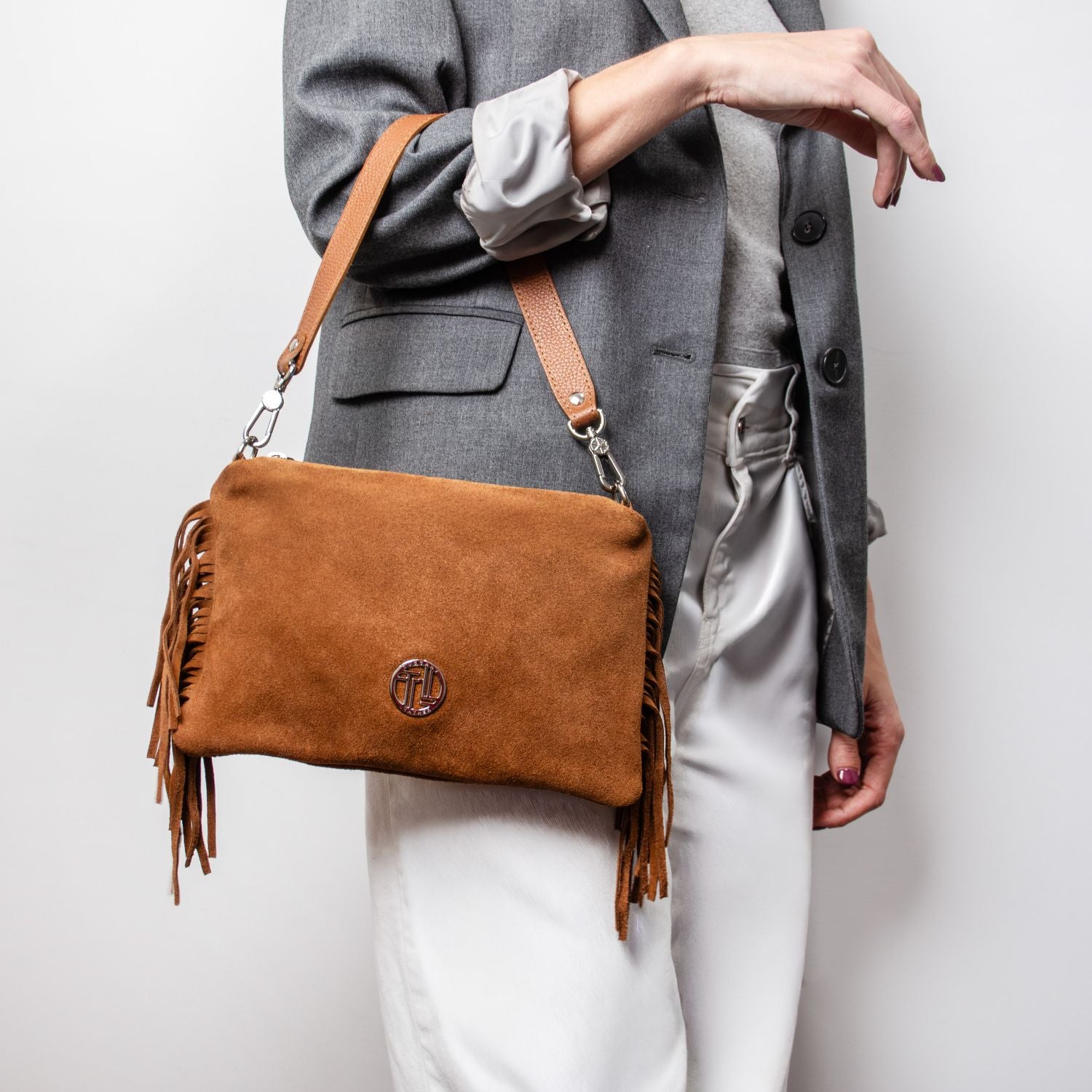 TL142495 – Nomade – Suede leren fringe Clutch