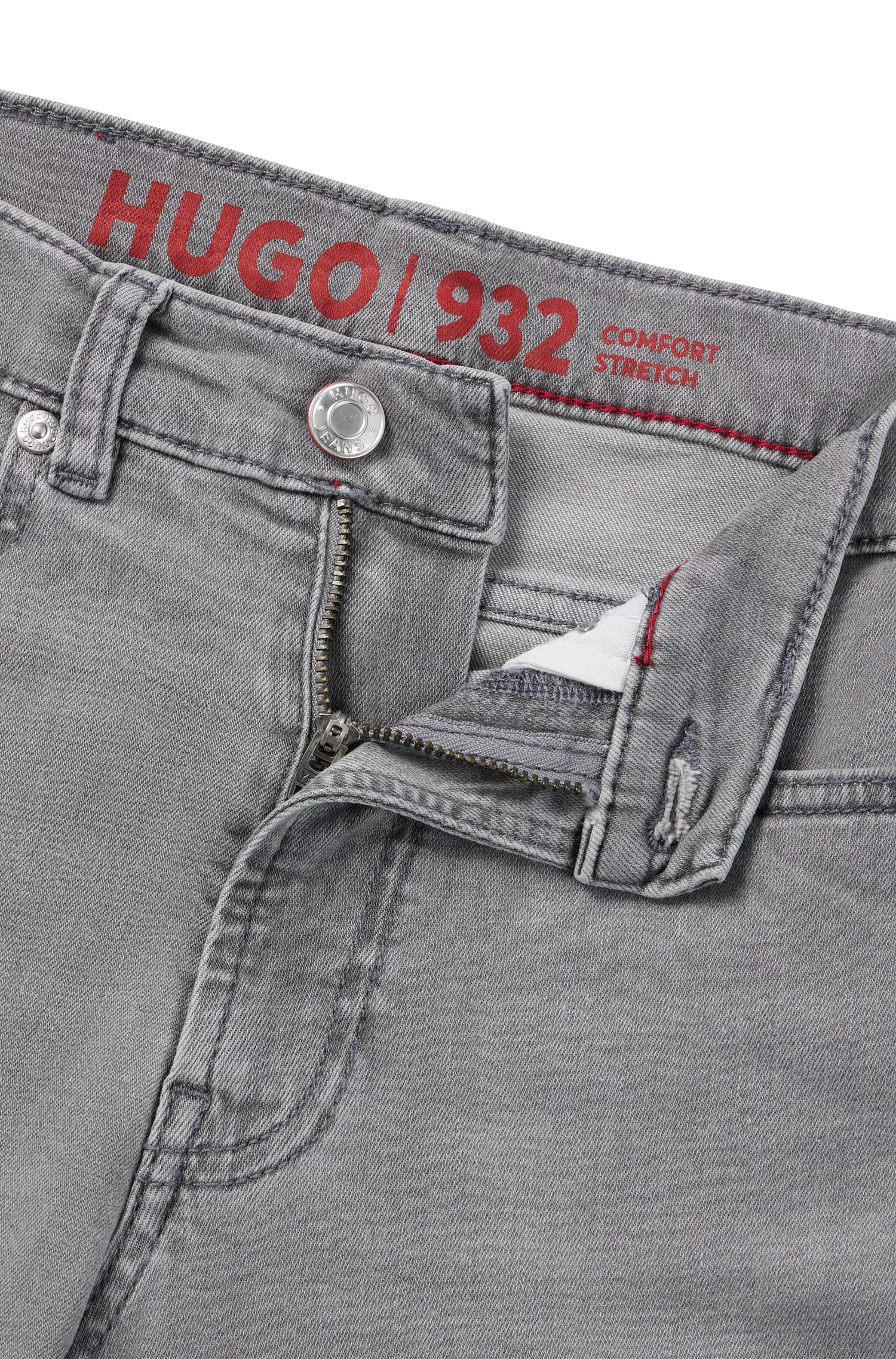 Calça jeans HUGO vermelha, extra slim fit, em denim stretch cinza.