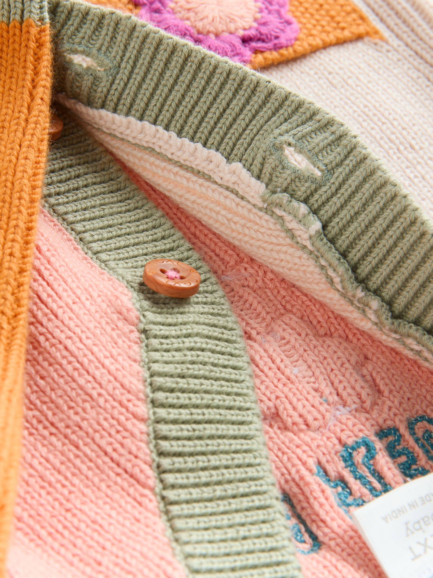 Felle kleurvlakken - Babyvest met borduursel (0 mnd-2 jr)