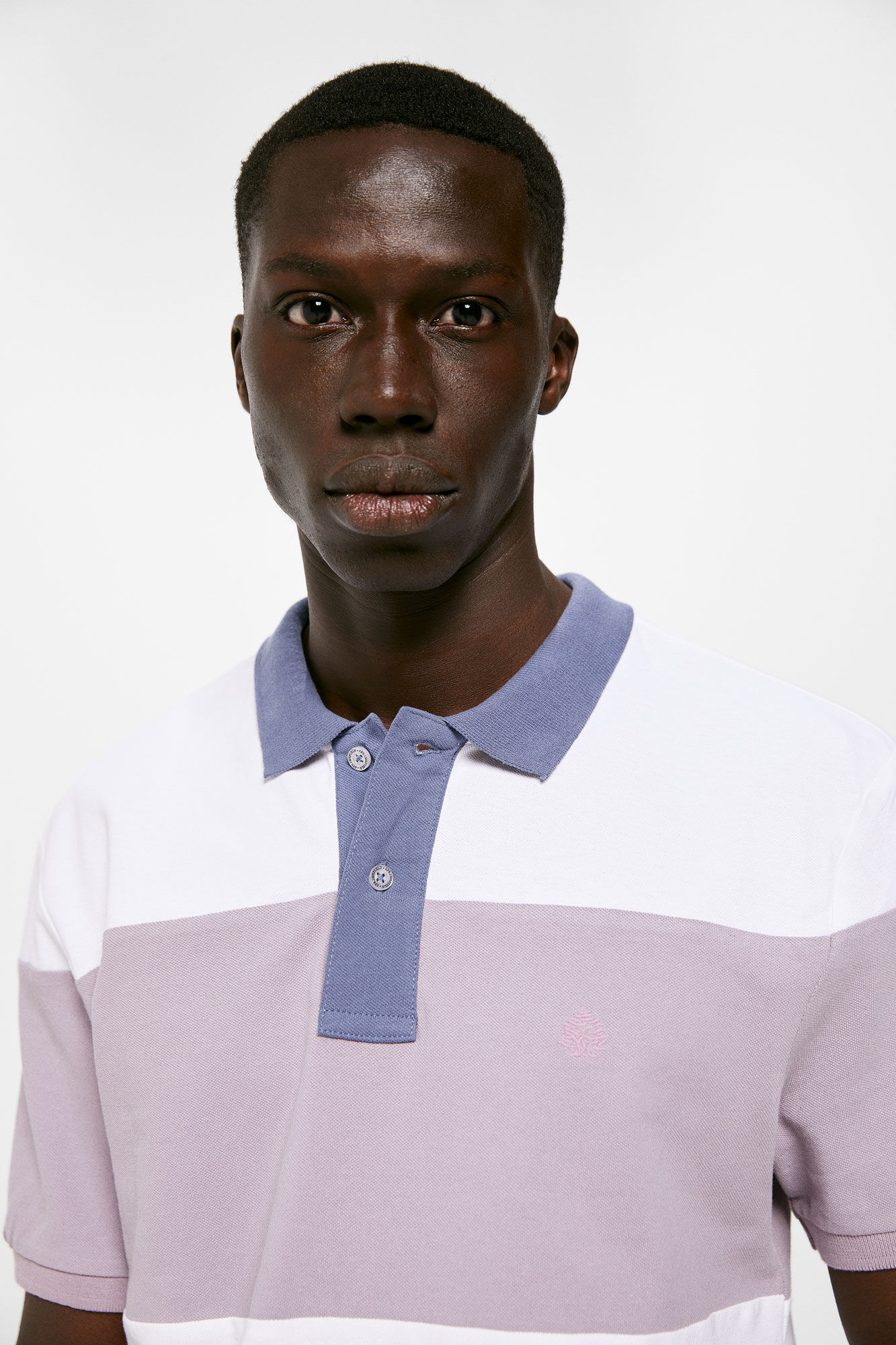 Polo piqué color block - azul médio