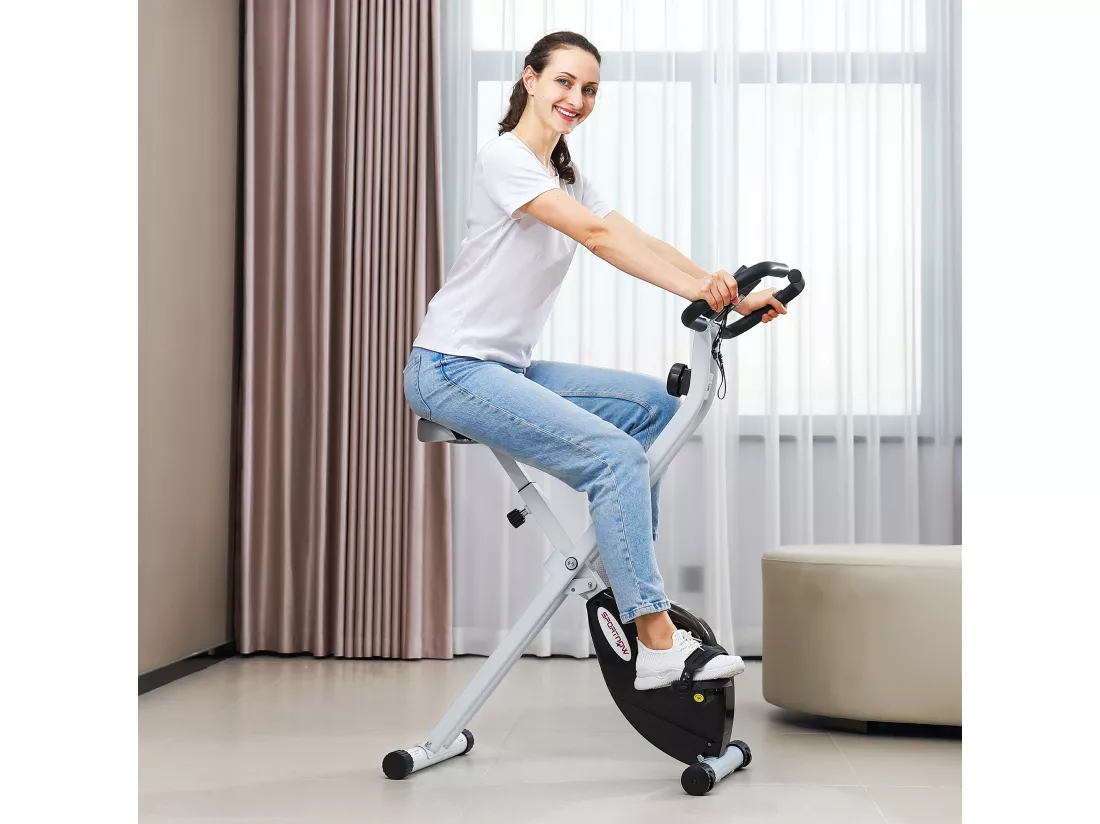 Vélo d'appartement pliant, vélo fitness silencieux vélo d'intérieur avec résistance magnétique à 8 niveaux, capteur de fréquence cardiaque, siège réglable, écran LCD et roulettes, blanc
