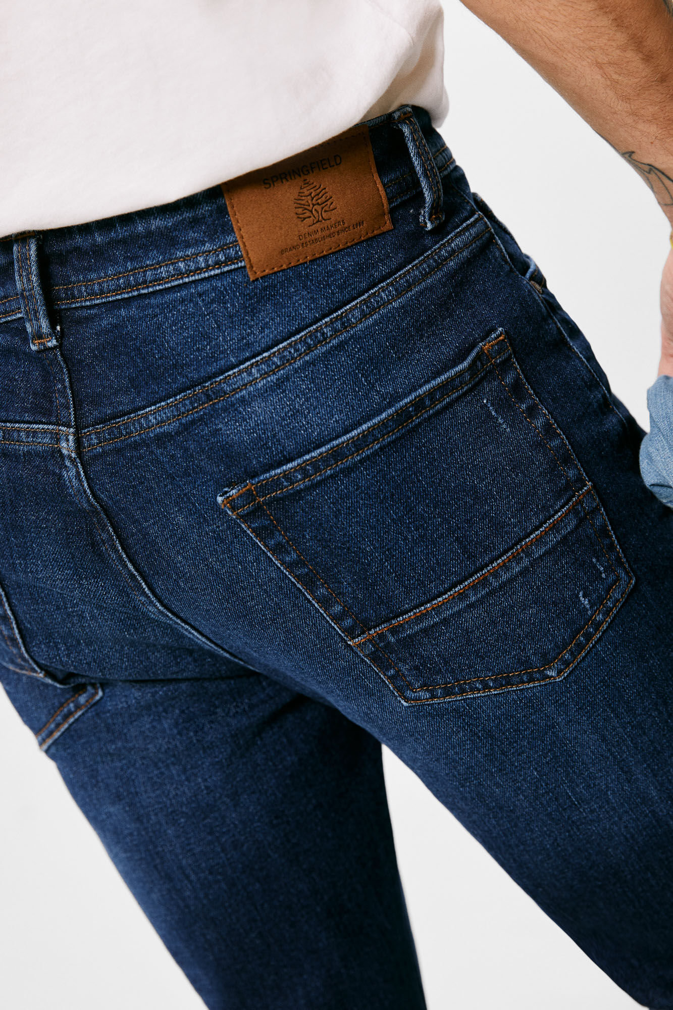 Calça jeans slim de lavagem média escura - Azul médio