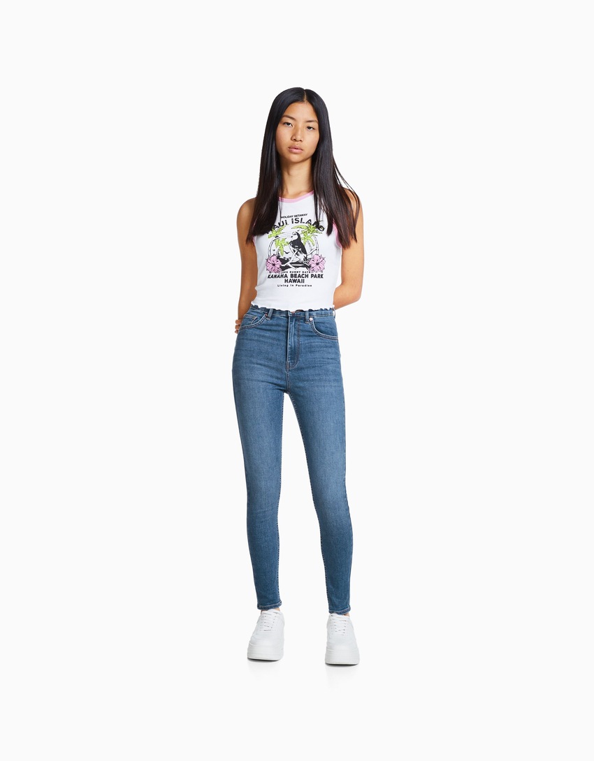 calça jeans skinny de cintura super alta