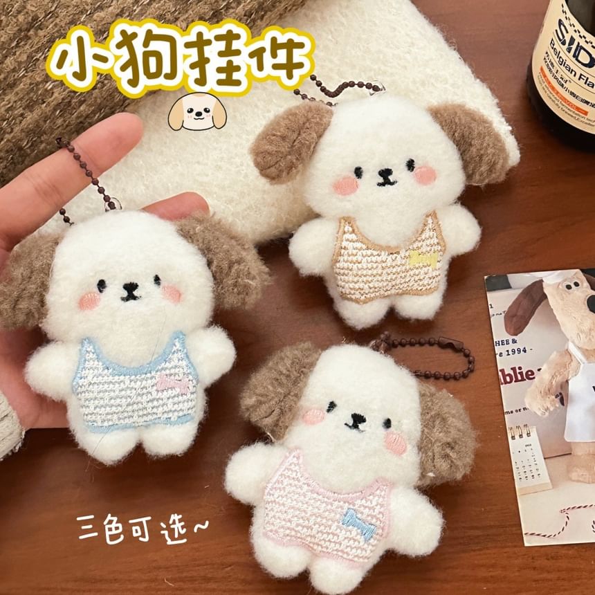Tuhat - Sleutelhanger / Broche in de vorm van een tas met een pluchen hond