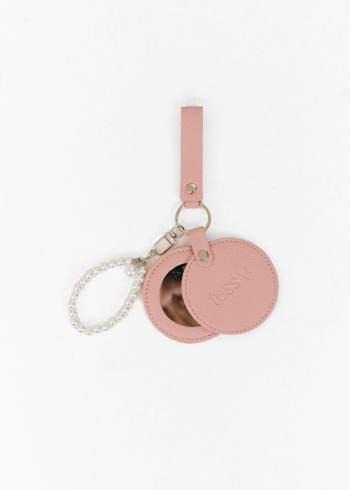Nora bag charm lichtroze