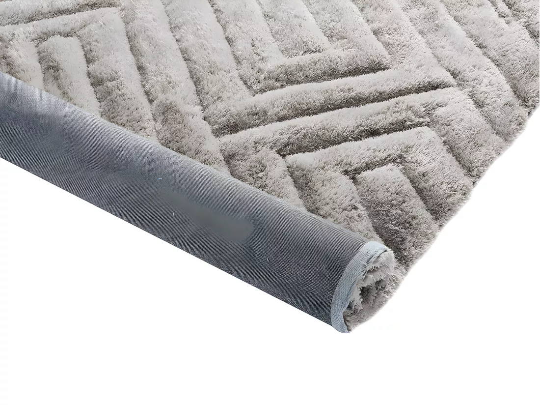 Ensemble table basse plateau pivotant transparent JOLINE et tapis shaggy gris MAZE